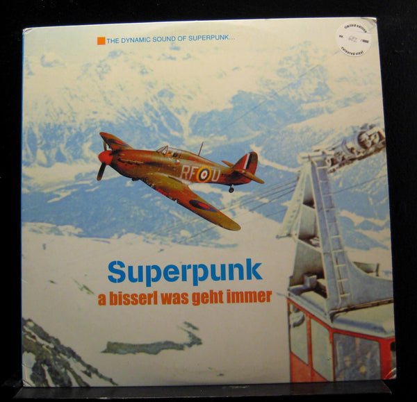 Superpunk - A Bisserl Was Geht Immer - LP Mint- LP Record 1998 Apricot Germany Blue Vinyl & Numbered - Indie Rock - Shuga Records