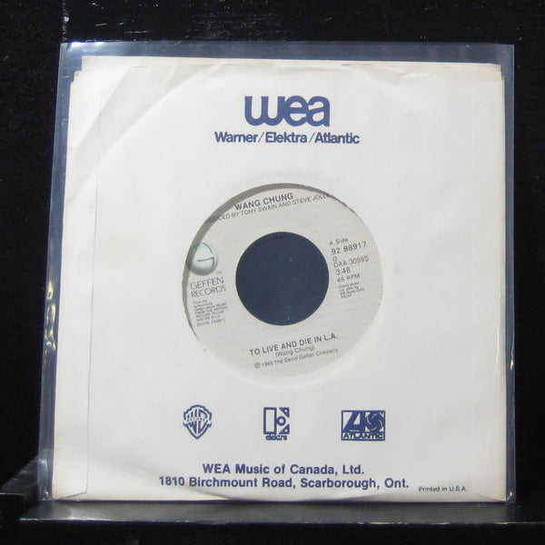 45 Wang Chung - To Live And Die In L.A. / Black-Blue-White 7" Mint- 92 88917 - Shuga Records