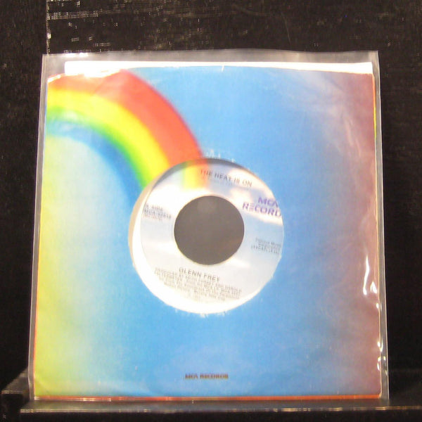 Glenn Frey - The Heat Is On / Shoot Out 7" Mint- MCA-52512  Vinyl 45 - Shuga Records
