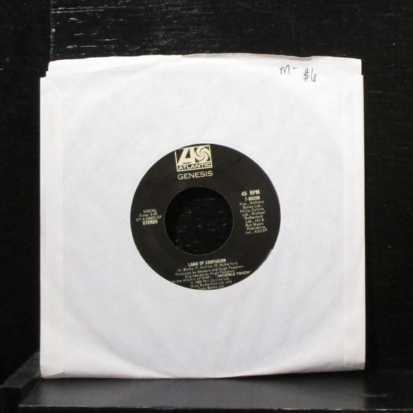 Genesis - Land Of Confusion / Feeding The Fire 7" Mint- Vinyl 45 7-89336 USA - Shuga Records