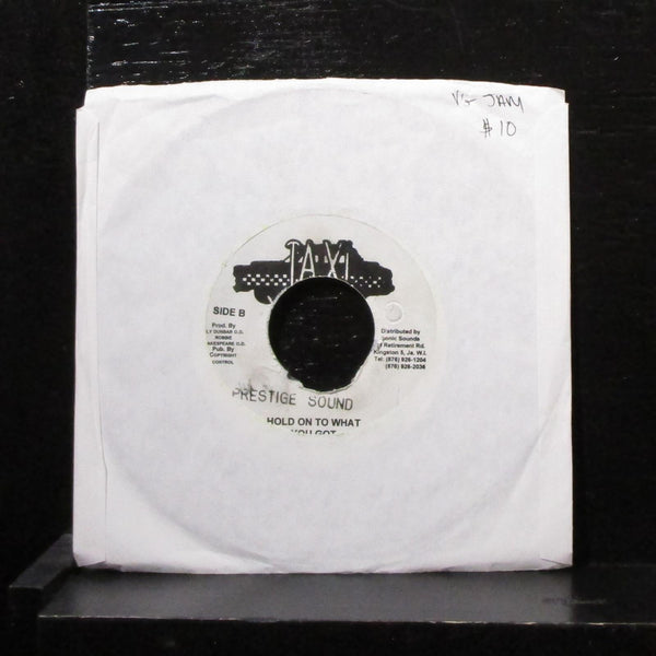 Dennis Brown - Hold On To What You Got 7" VG Vinyl 45 Taxi Jamaica - Shuga Records