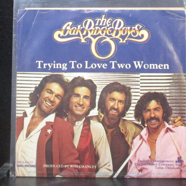 The Oak Ridge Boys - Trying To Love Women 7" Mint- Promo Vinyl 45 MCA-41217 USA - Shuga Records