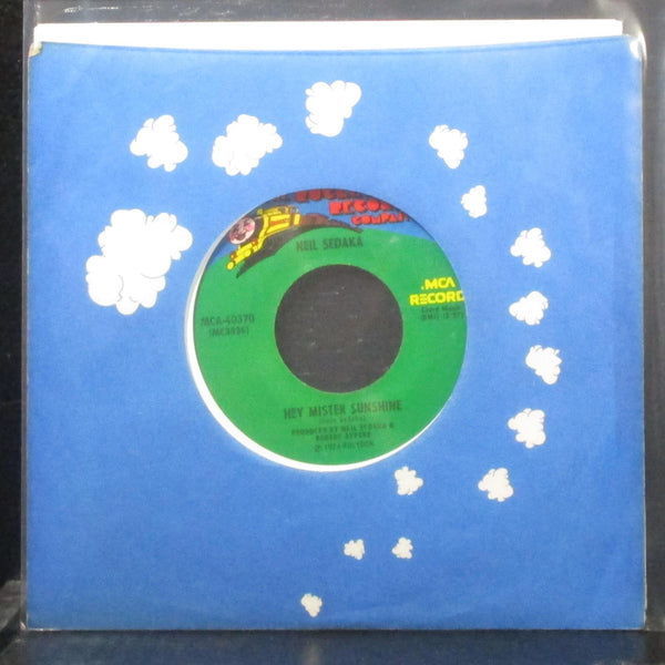 Neil Sedaka - The Immigrant / Hey Mister Sunshine 7" Mint- 45 Rocket MCA-40370 - Shuga Records