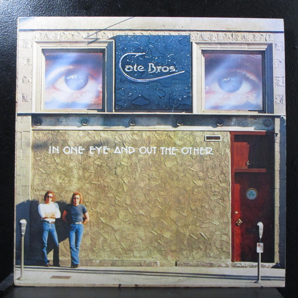 Cate Bros. - In One Eye And Out The Other Mint- LP Asylum 7E-1080 USA 1976 - Shuga Records