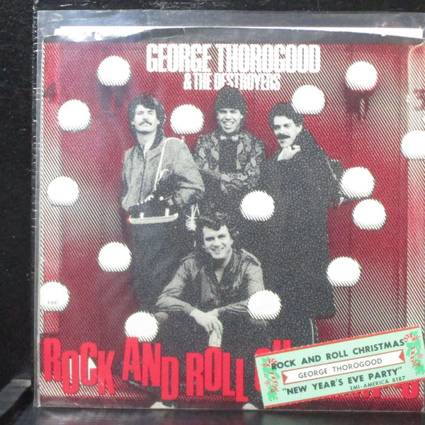 George Thorogood - Rock And Roll Christmas 7" Mint- EMI B-8187 USA 1983 + tag - Shuga Records