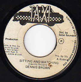 Dennis Brown Sitting And Watching- VG- 7" SIngle 45RPM- Taxi Jamaica- Reggae