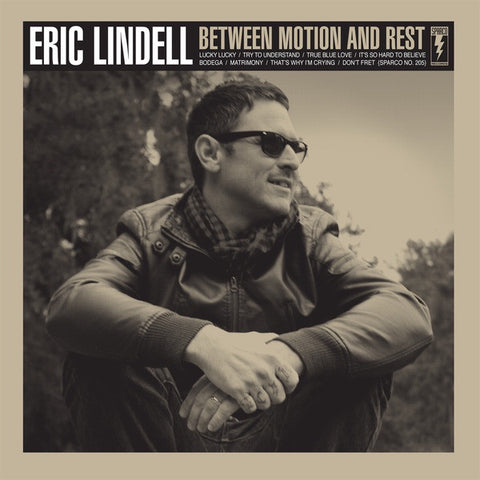 Eric Lindell – Between Motion And Rest - Mint- LP Record 2010 Sparco USA Orange Transparent Vinyl, Screen Printed Cover & Numbered - Rock / Blues Rock / Soul