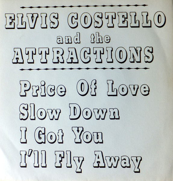 Elvis Costello – Hiding Under Covers - Mint- 7" Single Record 1982 Mr Norman Brain  UK Vinyl - New Wave / Punk - Shuga Records