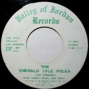The Christian Con-Man ‎– The Emerald Isle Polka / A Blade Of Grass VG- (Low) 7" Single 45 rpm 1984 Valley of Jordan Records USA - Folk / Spoken Word